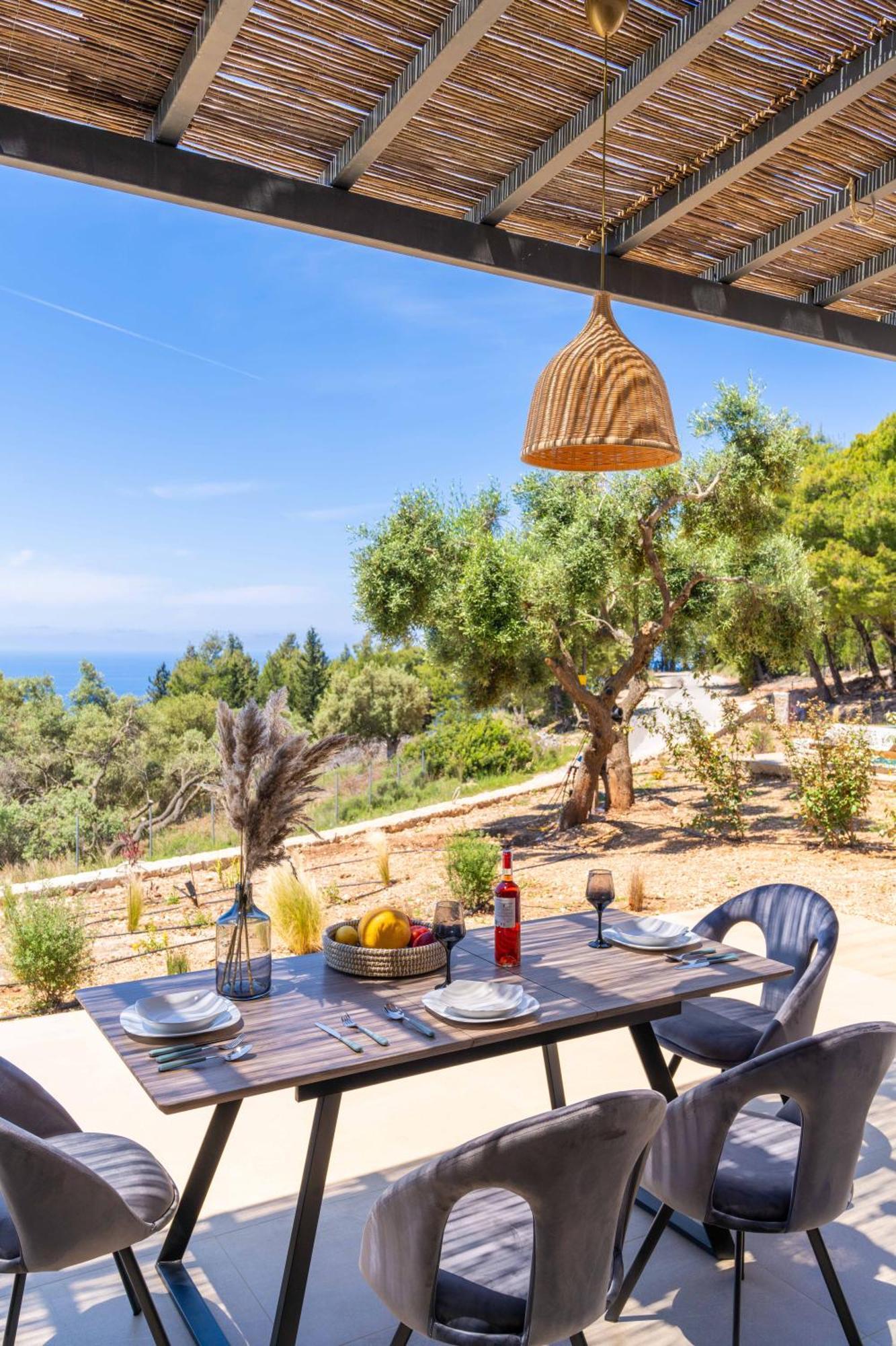 Mellamare Luxury Suites Athanion Bagian luar foto
